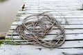 Fishing boat cables on a pontoon covered with morning frost Royalty Free Stock Photo