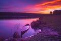 Fishing Boat on a Calm river at Sunrise Royalty Free Stock Photo