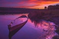 Fishing Boat on a Calm river at Sunrise Royalty Free Stock Photo