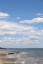 Fishing boat in the cloundy sea