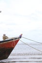 Fishing boat in the cloundy sea