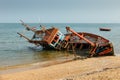 Fishing boat crashed lies on its side Royalty Free Stock Photo