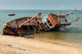 Fishing boat crashed lies on its side Royalty Free Stock Photo