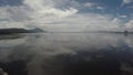 Fishing boat crossing the Huge surrounding lake of Taal Vocano