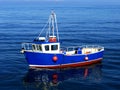 Small Fishing Boat at Sea Royalty Free Stock Photo