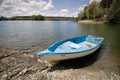 Fishing boat on the Danube River shore in Romania Royalty Free Stock Photo