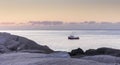 Fishing boat at dawn at Peggy`s Cove in Nova Scotia, Canada