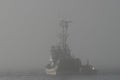 Fishing Boat In Deep Fog Royalty Free Stock Photo