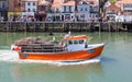 A Fishing Boat Departs the Seaside Town of Whitby