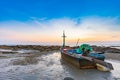 Fishing boat dock on the beach with sunset sky Royalty Free Stock Photo
