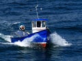 Small Fishing Boat at Sea