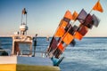 Fishing boat with flags close view