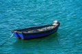 Fishing boat floating on peaceful sea Royalty Free Stock Photo