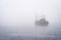 Fishing Boat in Fog Royalty Free Stock Photo