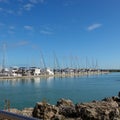 A fishing boat in front of a marina on the intracoastal waterway in Ft. Pierce, Florida