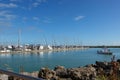 A fishing boat in front of a marina on the intracoastal waterway in Ft. Pierce, Florida