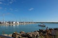 A fishing boat in front of a marina on the intracoastal waterway in Ft. Pierce, Florida