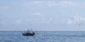 Fishing Boat with Gulls in ocean Royalty Free Stock Photo