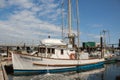 Fishing boat in the harbor at the sunny summer day in Victoria BC. Scania Queen Boat moored in fisherman Wharf