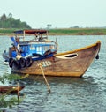 Fishing Boat on Hoi An River, Vietnam. Royalty Free Stock Photo