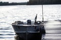 Fishing boat hull tied to a dock at day end after fishing. Royalty Free Stock Photo