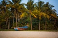 Fishing boat of Indian fishermen on the sandy beach in Kerala, fishing village Mararikulam. Royalty Free Stock Photo