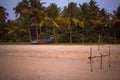 Fishing boat of Indian fishermen on the sandy beach in Kerala, fishing village Mararikulam. Royalty Free Stock Photo