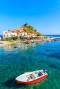 Fishing boat in Kokkari bay, Samos island, Greece Royalty Free Stock Photo