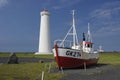 Fishing boat and lighthouses, Gardur, Iceland
