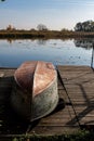 Fishing boat made of metal, upside down. Royalty Free Stock Photo