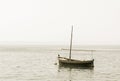 Fishing boat with a mast in sea Royalty Free Stock Photo