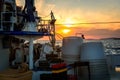 Fishing boat moored or docked at pier in sunset Royalty Free Stock Photo