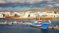 Fishing boat moored in the harbor of La Graciosa island, in Caleta de Sebo, Lanzarote, Canary Islands