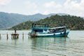 Fishing boat moored at old wharf Royalty Free Stock Photo