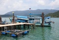 Fishing boat moored at old wharf Royalty Free Stock Photo