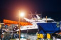Fishing boat moored at the pier in the evening Royalty Free Stock Photo