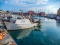 Fishing boat moored in the port of Genoa Genova, Italy.