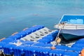 Fishing boat moored to floating dock Royalty Free Stock Photo