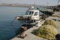 fishing boat and nets at the pier in Kokkinos Pyrgos, Greece.