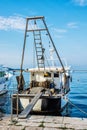 Fishing boat with nets in port, Porec, Croatia Royalty Free Stock Photo