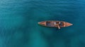 Fishing from a boat in the open ocean, a hobby of catching fish. Beautiful seascape, aerial view. travel banner. Royalty Free Stock Photo