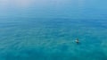 Fishing from a boat in the open ocean, a hobby of catching fish. Beautiful seascape, aerial view. travel banner. Royalty Free Stock Photo