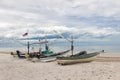 Fishing boat park on the beach with sea background Royalty Free Stock Photo