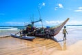 Fishing Boat Park On The Brown Beach