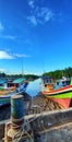 Fishing boat parked at harbor.