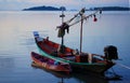 Fishing boat at the pier is fully prepared and equipped for fishing .