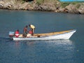 A fishing boat re-fueling in the caribbean. Royalty Free Stock Photo