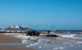 Fishing boat ready to be towed back to shore