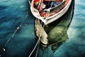 Fishing boat with reflection on the sea Royalty Free Stock Photo