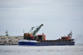 Fishing boat returning to harbor Royalty Free Stock Photo